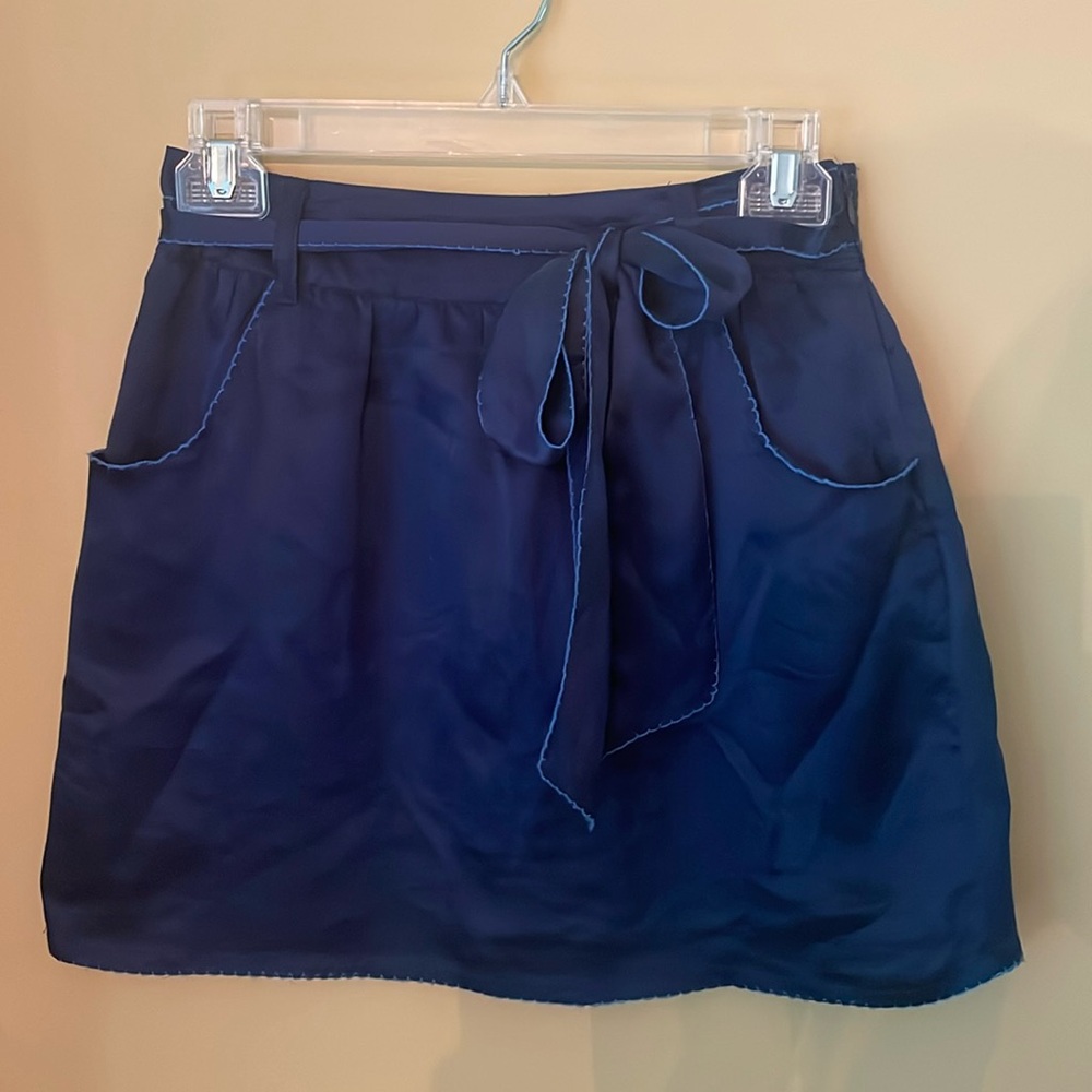 Silky mini skirt with tie belt and side pockets